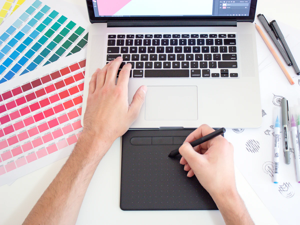 Designer creating a brand identity with color swatches
