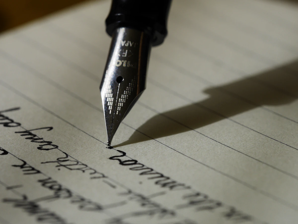 Fountain pen writing a manuscript